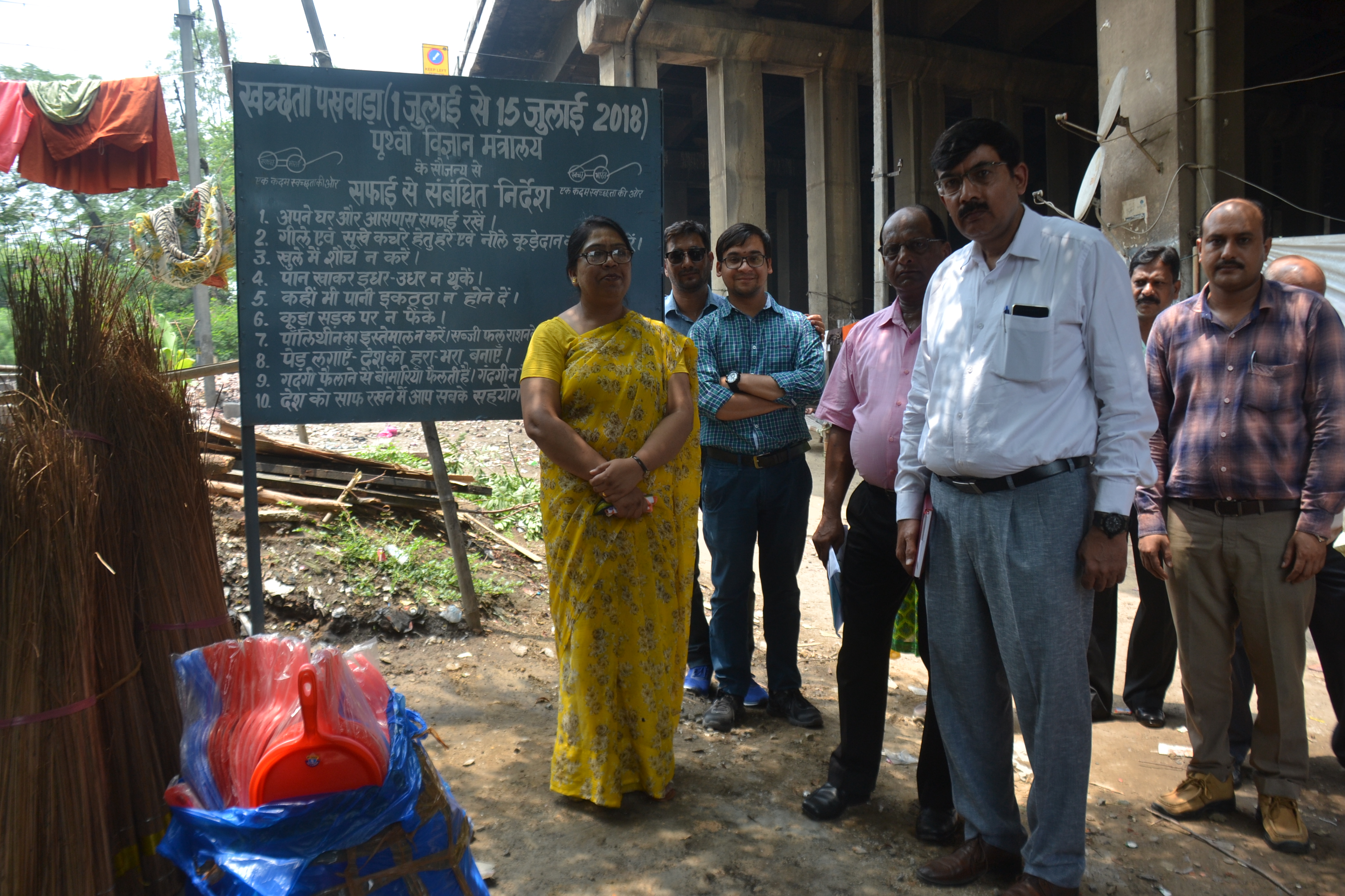 Distrubution of Broom & Dust Pan in Slum Area