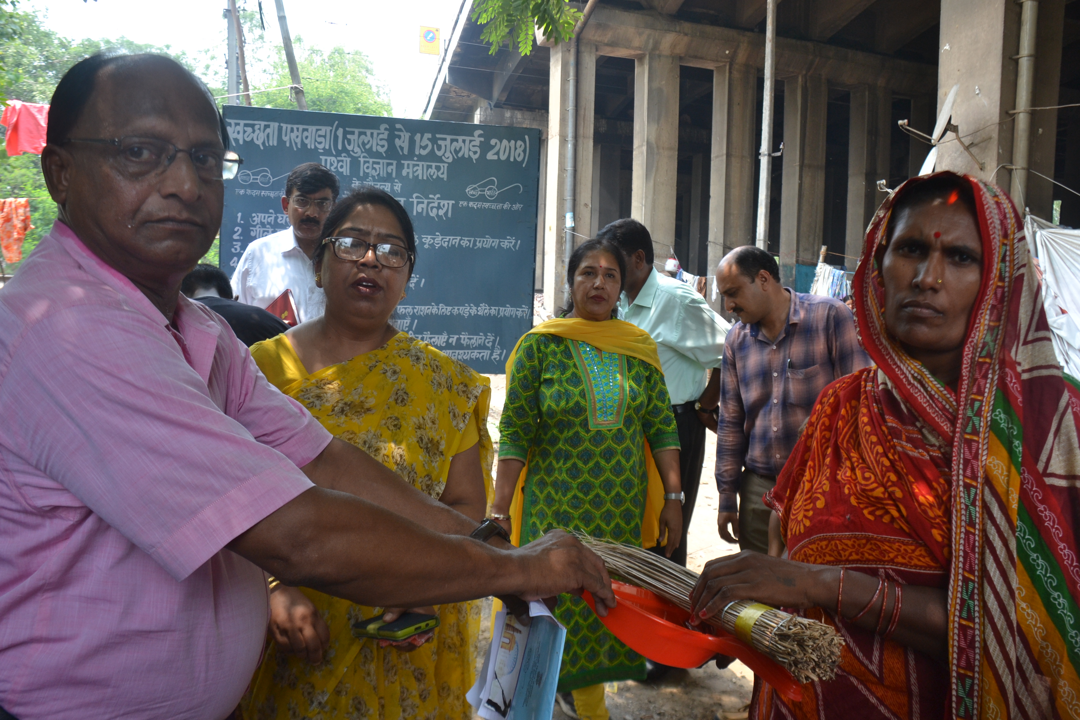 Distrubution of Broom & Dust Pan in Slum Area