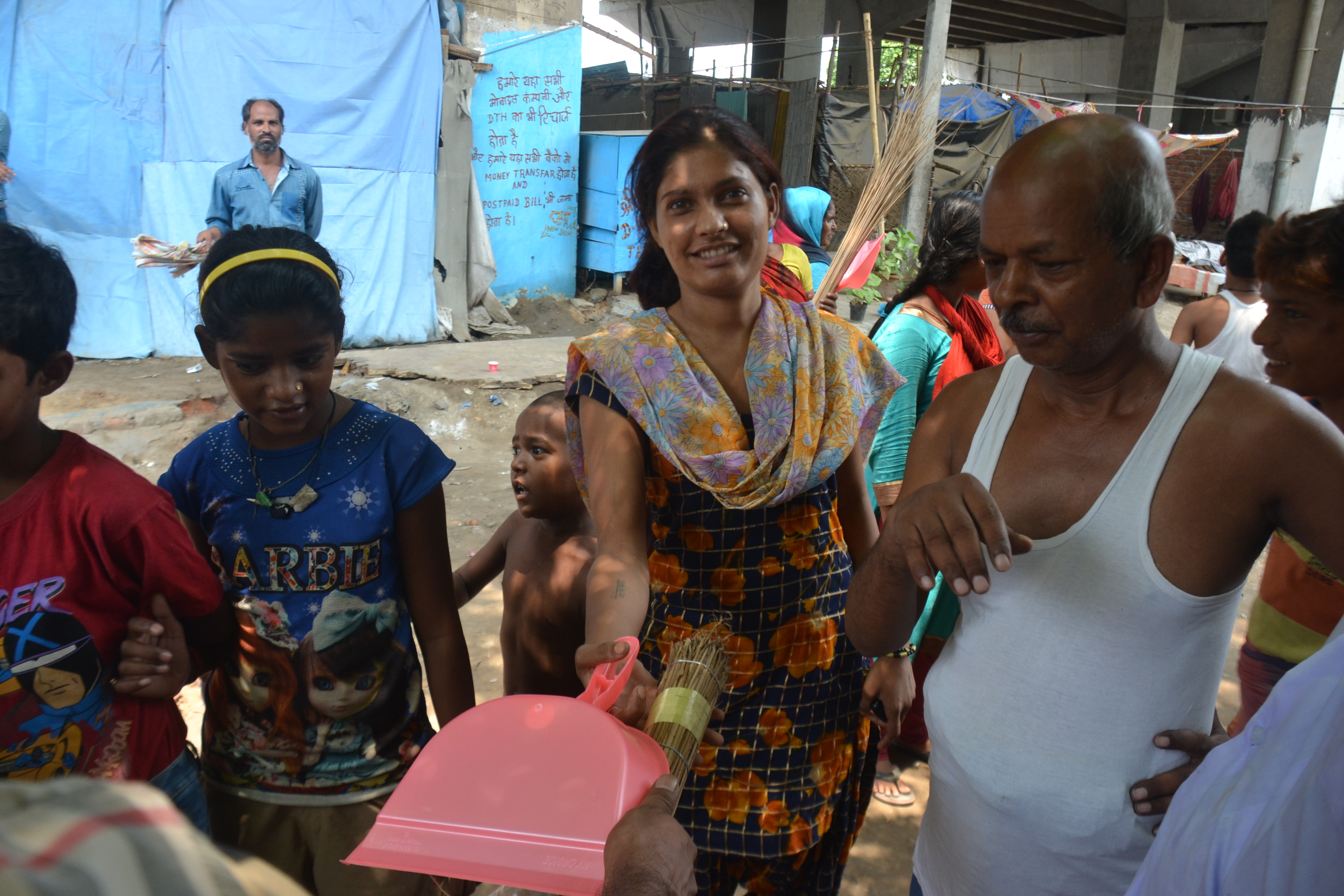 Distrubution of Broom & Dust Pan in Slum Area