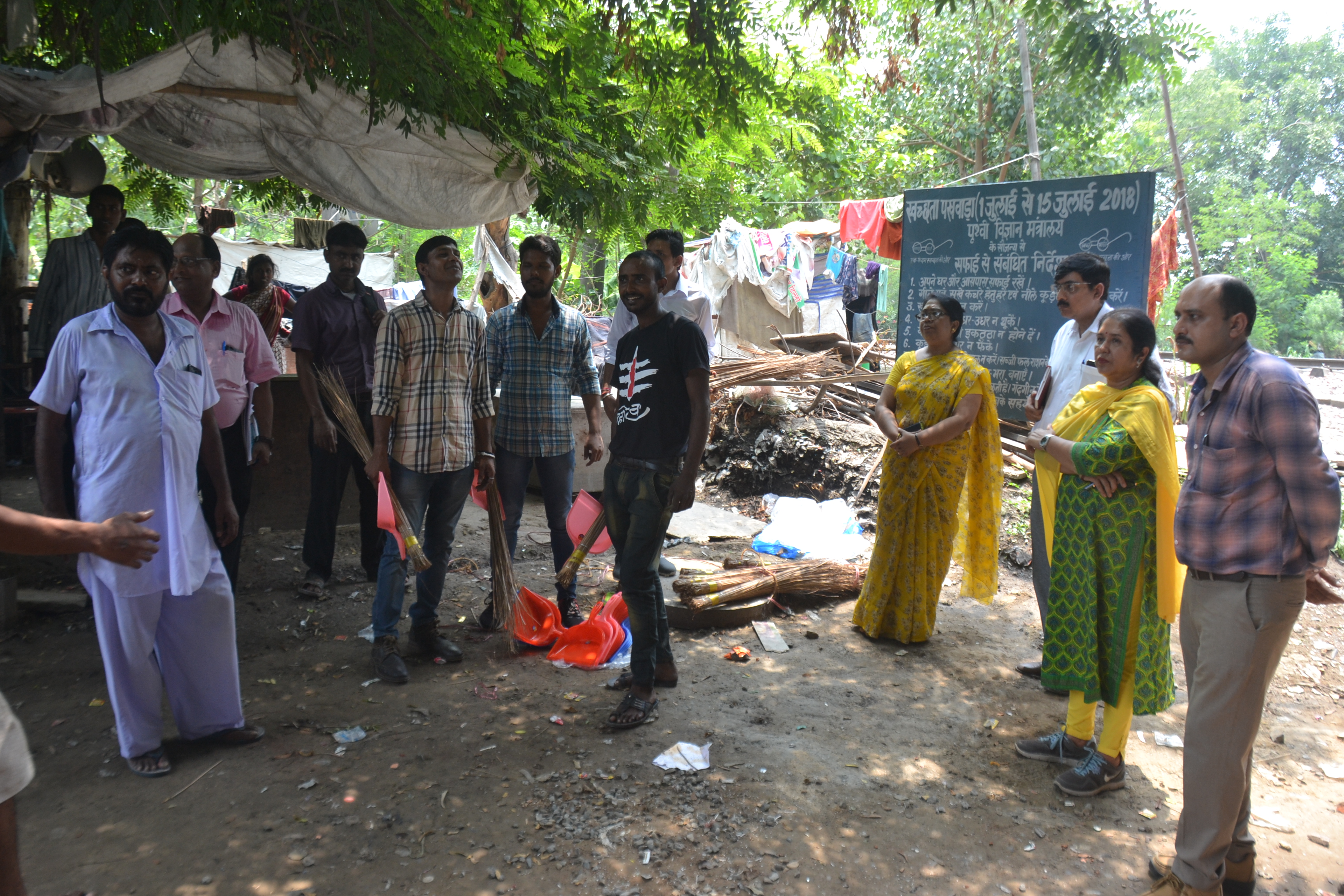 Distrubution of Broom & Dust Pan in Slum Area